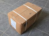 a cardboard box sitting on the floor on the floor