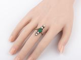 an image of a woman ' s hand with a ring on it