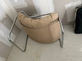 a chair that is sitting in the corner of a room