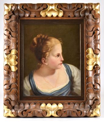 portrait d'une femme en robe bleue dans un cadre doré