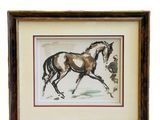 tableau représentant un cheval galopant dans la neige, dans un cadre en bois