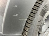 a close up of a tire on a car