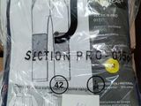 a picture of a person standing next to a box of clothing