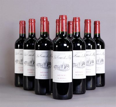 six bottles of red wine are lined up in a row