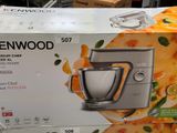 a box of kenwood mixer on display in a store