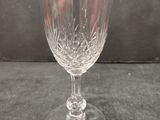 a wine glass that is sitting on a table