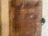 a picture of a piece of wood on a wall