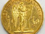une image représentant une pièce d'or sur laquelle figure un ange