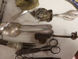 many different types of spoons and spoons on the table