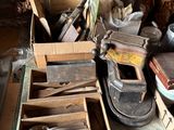 a pile of junk on a table in a room