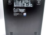 the back of a laptop with a black back panel and a white back panel