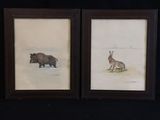 deux tableaux encadrés représentant un ours et un cerf dans un champ