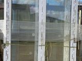 a white cabinet with a glass door and a yellow rope