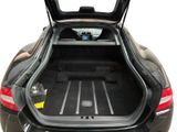 the back of a car with its trunk open showing the cargo compartment