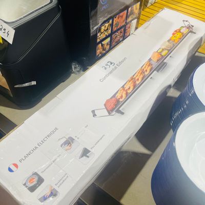 a box of food sitting on a table in a store