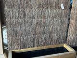a pile of straw sitting on top of a pallet