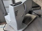 a machine that is sitting on a counter in a kitchen