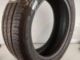 a close up of a tire on a white surface