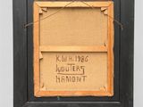 an old picture frame with writing on it sitting on top of a wooden table