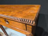 an image of a wooden table with a drawer on top of it