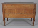 an old wooden chest sitting on top of a wooden table