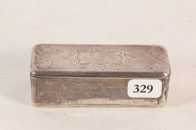 a small silver box with a number on it