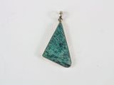a triangle shaped pendant with a green stone in the center
