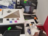 a lot of electronic items that are sitting on the floor