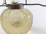 a light that is hanging off of a light fixture