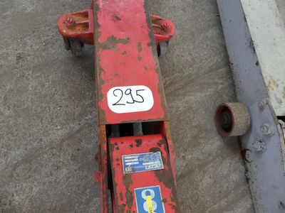a red fire hydrant that has a number on it