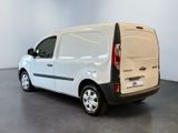 a white van that is parked in a room