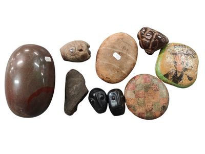 many different types of rocks on a white surface