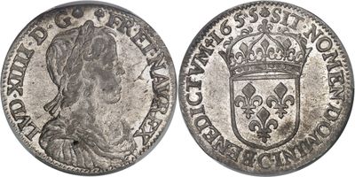 une pièce d'argent surmontée d'une couronne