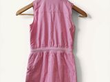 a picture of a pink dress hanging on a hanger