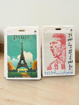 two bags that are sitting on the floor next to each other