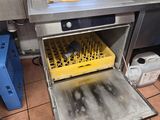 an image of a dirty kitchen with a dishwasher in it
