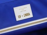 the inside of a blue purse with a white label on it
