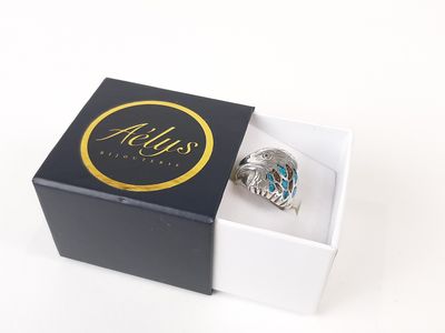 Harpo, bague en argent à motif de tête d'aigle et incrsutati…
