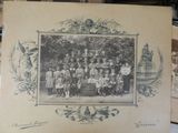 an old photo of a group of children posing for a picture