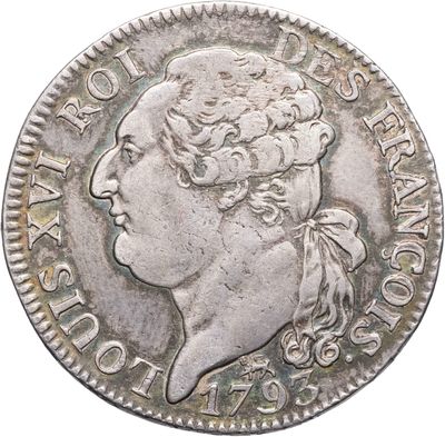 gros plan d'une pièce de monnaie sur fond blanc