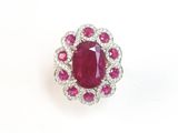an oval ruby and diamond ring