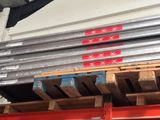 a stack of pallets sitting on top of a pallet rack