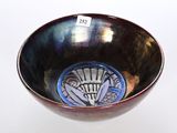 a bowl that has a design on the inside of it
