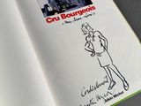 a book with a drawing of a woman in a dress