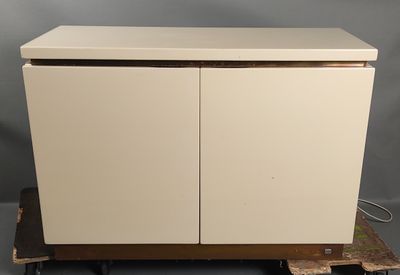 an image of a white cabinet sitting on top of a wooden pallet