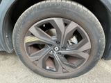 a close up of a tire on a car ' s rim