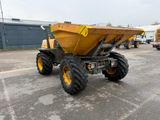 a large yellow dump truck parked in a parking lot