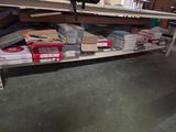 a lot of boxes and boxes on a shelf in a room
