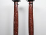 pair of antique red marble columns on black marble bases