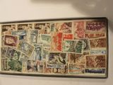 a picture of a picture of a wall with stamps on it